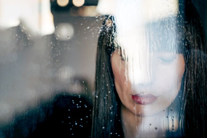 Stylish woman kissing glass