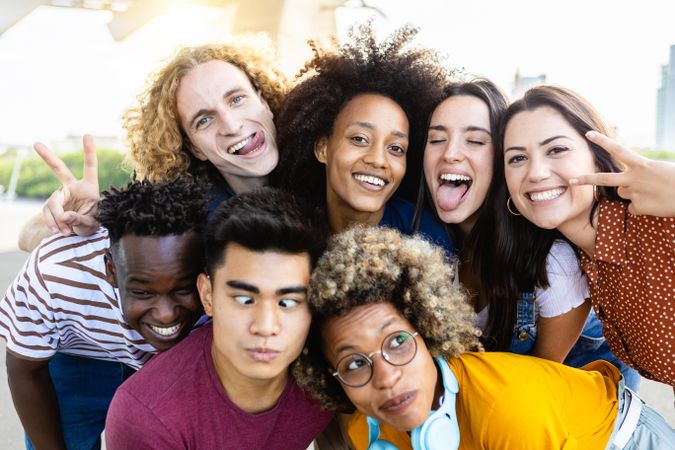 Portrait group of happy young best friends enjoying together outdoors