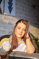 Portrait of smiling woman with green eyes