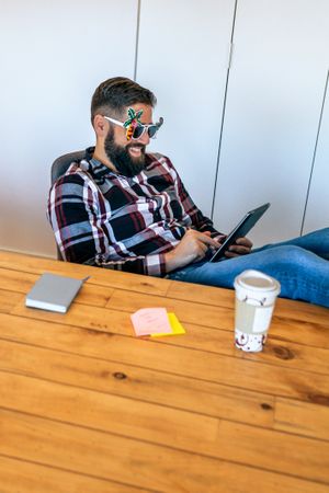 Happy office worker because he goes on vacation