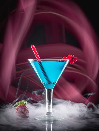 Glass with drink and berries