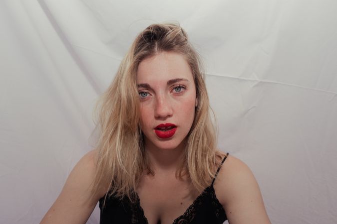 Stylish young blonde in trendy wear