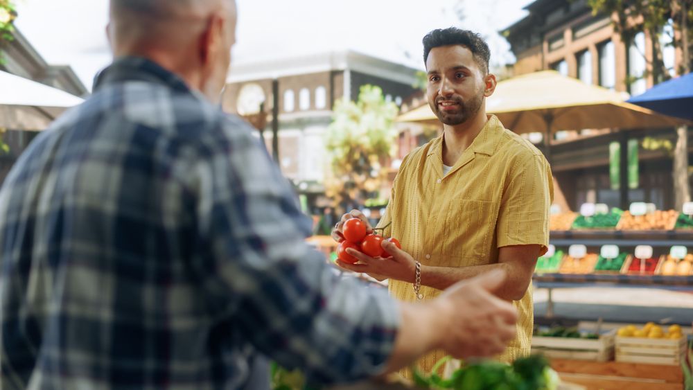 Portrait of a Customer Shopping for Organic Seasonal Fruits and Vegetables for a Healthy Breakfast.
