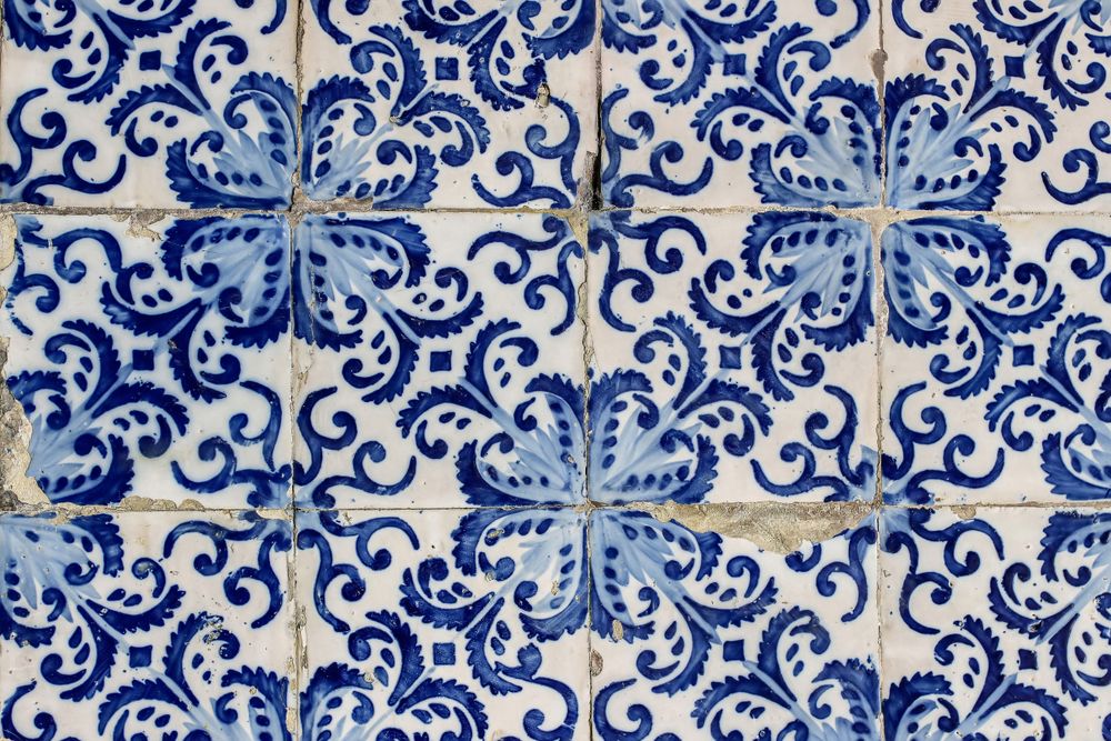Beautiful shabby facade, wall decoration of old Lisbon building, Portugal, decorative background.