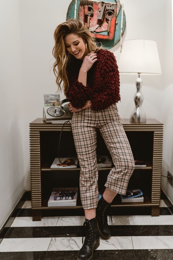 Cheerful woman in stylish room