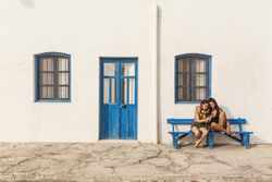 Girlfriends sitting on bench