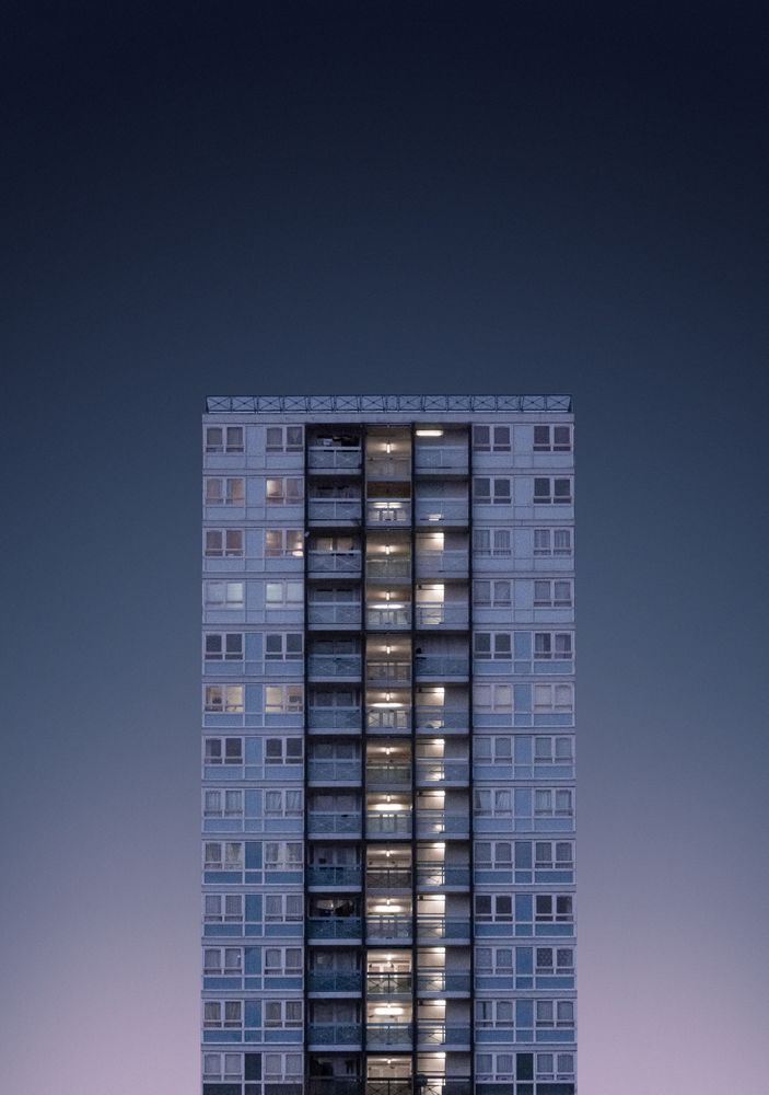 Apartments with lights on in the stairwell
