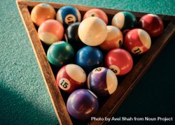 Looking down at rack of pool table balls 5nXw8b