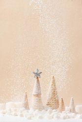 Christmas or New Year background with Christmas tree of waffle cones and falling sugar snow