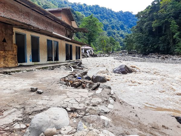 Tanah Datar, Indonesia - May 12, 2024: The back of a building affected by cold lava flash floods, a natural disaster in Lembah Anai, Sepuluh Koto District, Tanah Datar Regency, West Sumatra, Indonesia