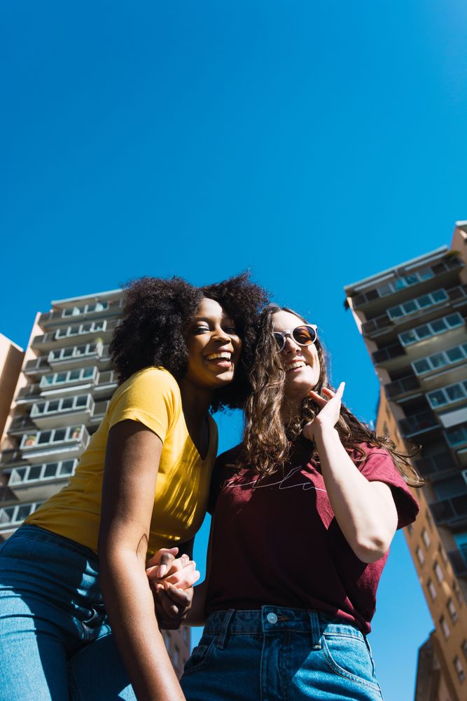 Bisexual woman and happy lesbian woman.