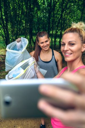 Two women taking a selfie after plogging
