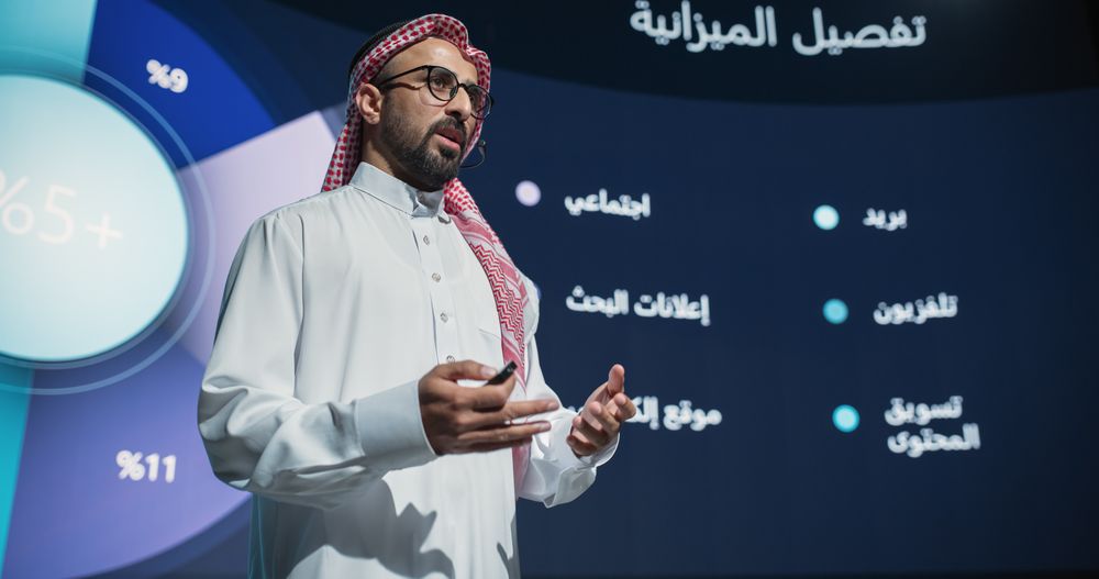 On Business Expo Stage: Famous Inspirational Speaker From Gulf Region Talking about Technology, Science, Success, Productivity.