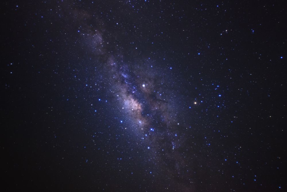 milky way galaxy and space dust in the universe, Long exposure photograph, with grain.