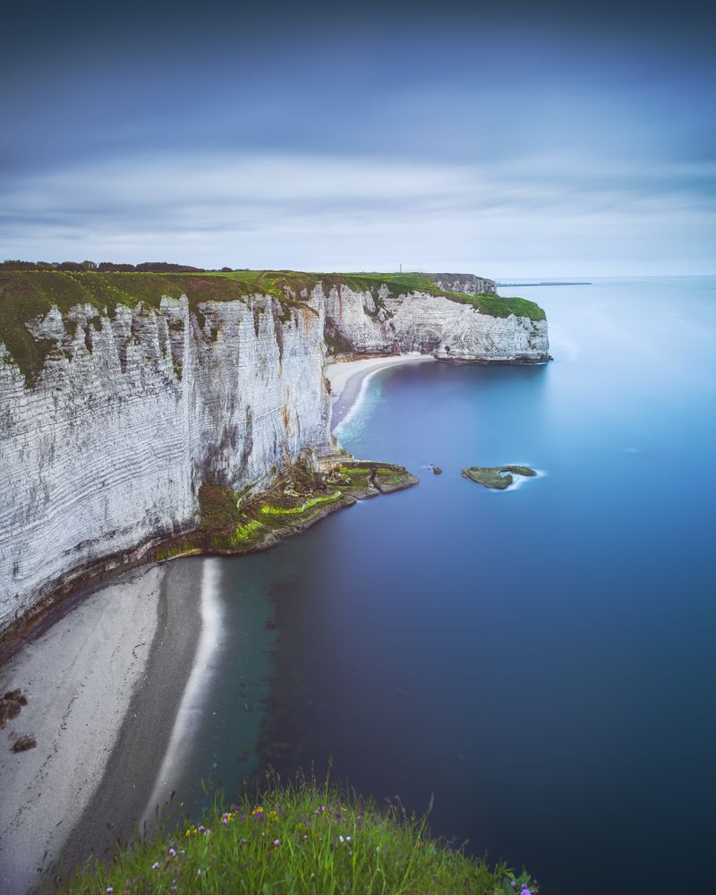Etretat coast, rocky cliff and beach. Aerial view. Normandy, France