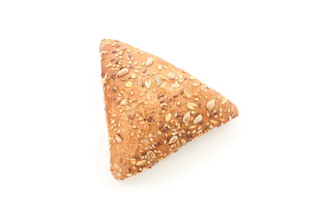 Triangular bun isolated on plain background, top view. Bakery products