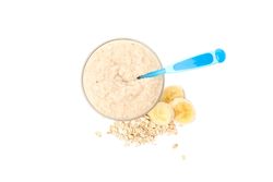 Bowl with healthy baby food isolated on plain background