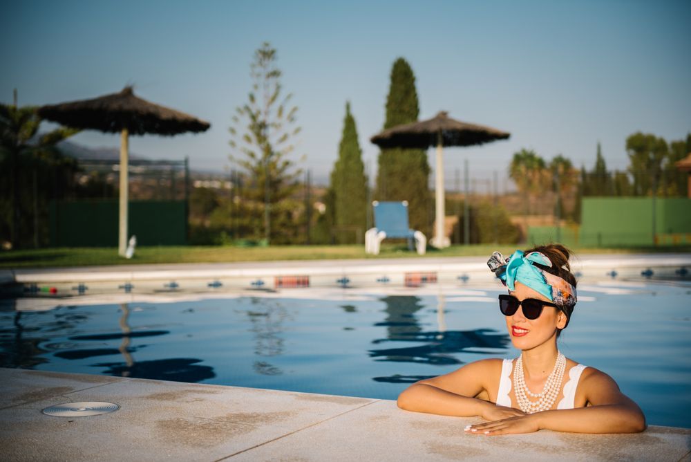 Young elegant chinese woman sunbathing
