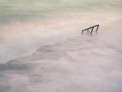 Cloudy fog over waving sea