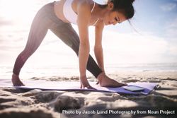 Woman stretching before yoga exercise 0g6wAb