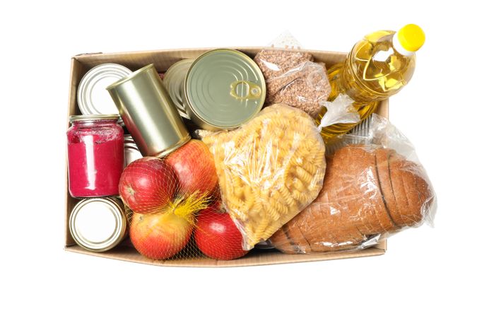 Donation box isolated on plain background. Paper box with food