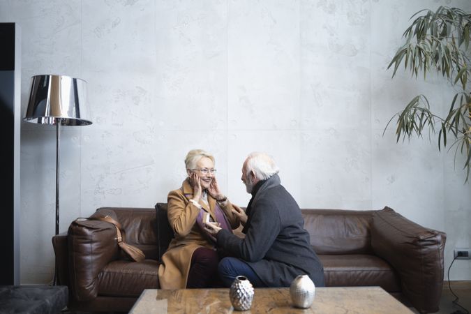 Older man proposing to woman