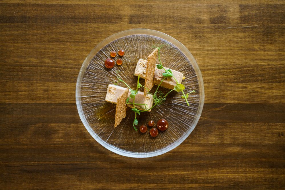 Ornate appetizer of foie micuit, top view