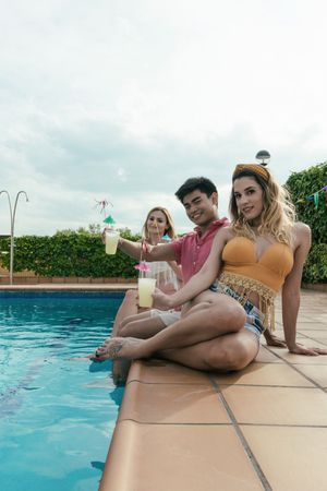 Group of friends having a pool party