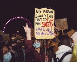 London, England, United Kingdom - March 16, 2021: Multi-ethnic group of protesters wearing facemarks
