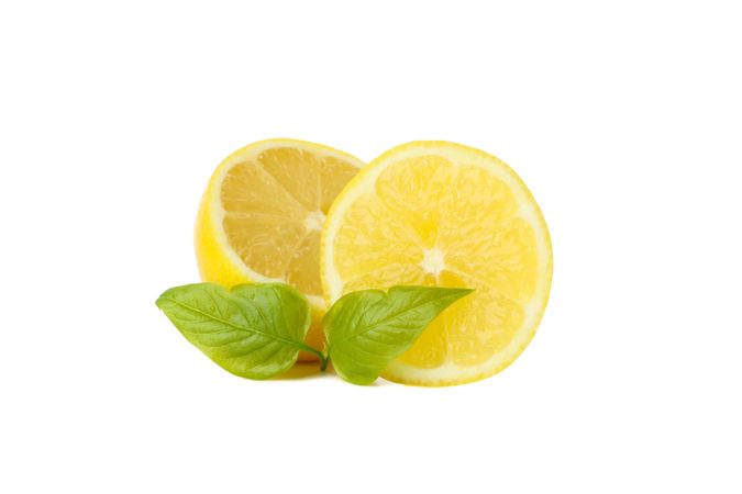 Fresh lemon isolated on light background. Ripe fruit