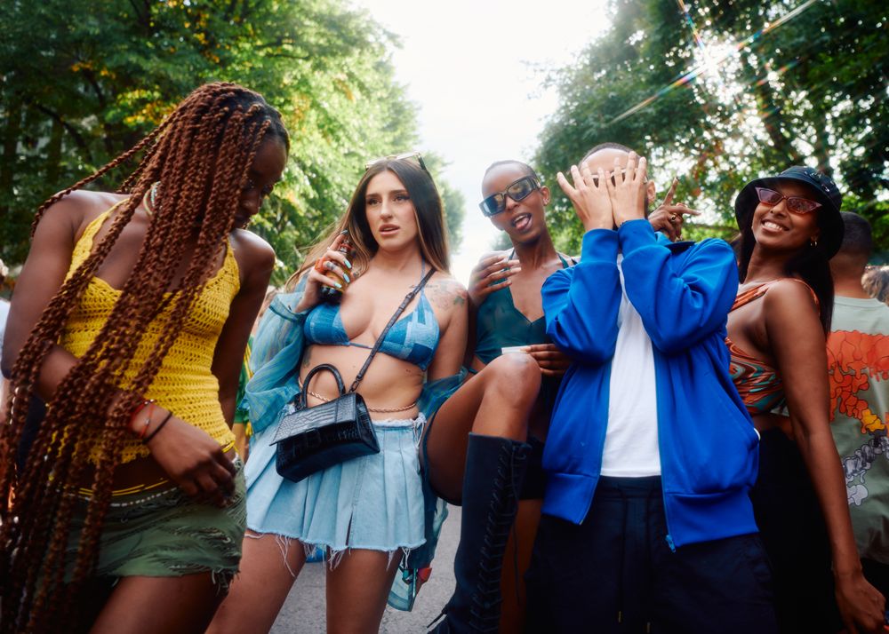 London, England, United Kingdom - August 28, 2022: Trendy young friends at Notting Hill Carnival