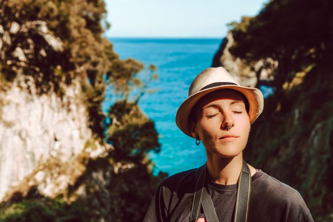 Female tourist contemplating landscape on daytime