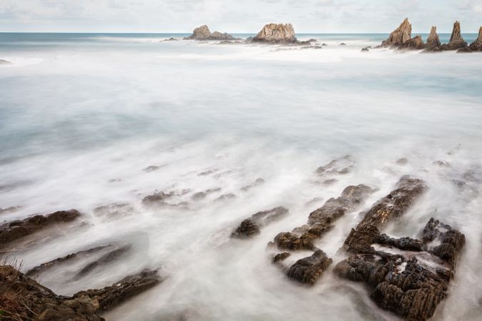 Wonderful ocean rocky coast in fair weather