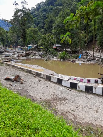 Tanah Datar, Indonesia - May 12, 2024: condition of the Mega Mendung water park which was affected by cold lava flash floods, natural disasters in Lembah Anai, Sepuluh Koto District, Tanah Datar Regency, West Sumatra, Indonesia