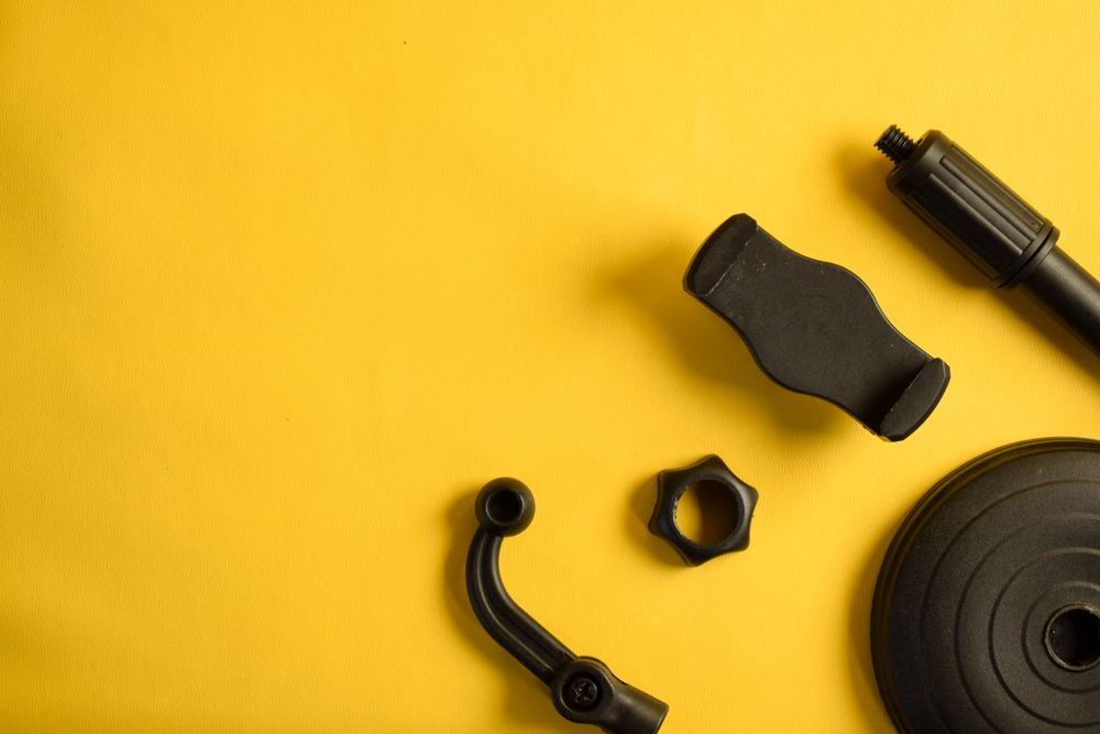 Phone accessories for stand on yellow background, with space for text