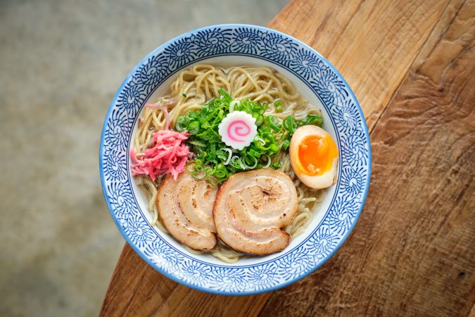 Plate with appetizing ramen soup