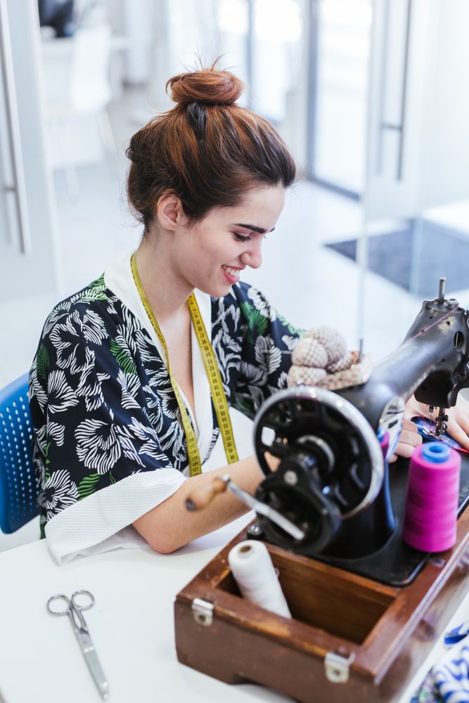 Woman in a sewing school