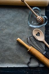 St. Valentine day card baking concept with heart shaped utensils