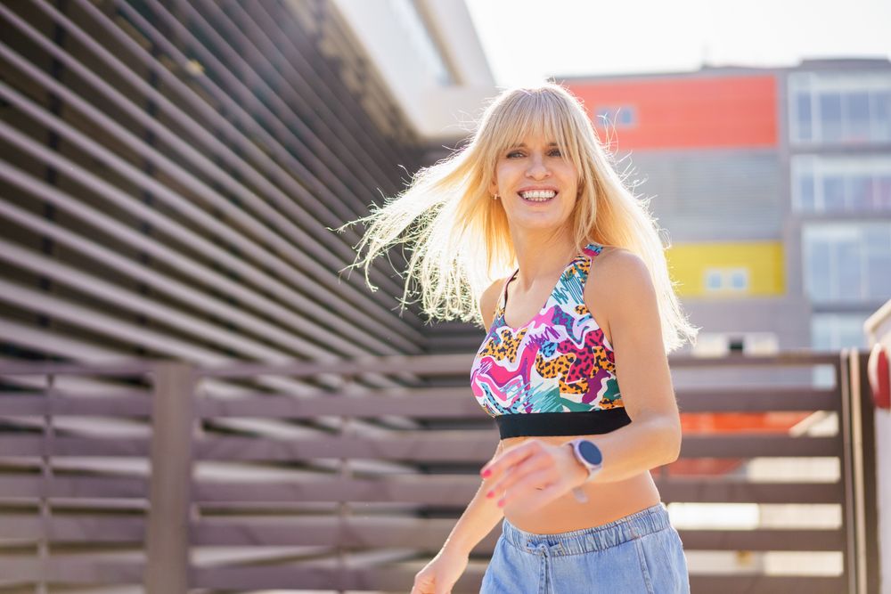 Careful blonde woman in city