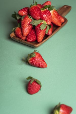Wooden platter of strawberries