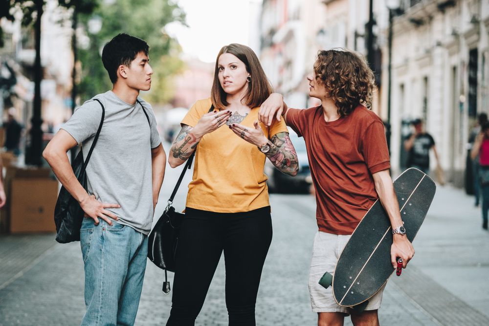 Multiethnic people talking on the street