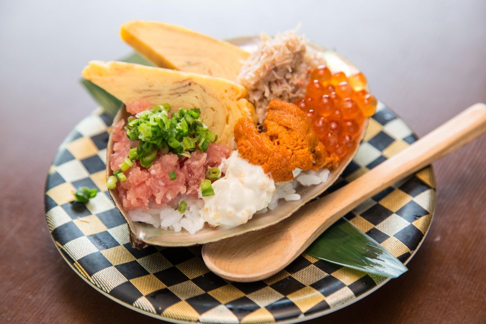 Fresh sashimi on a plate on wooden table