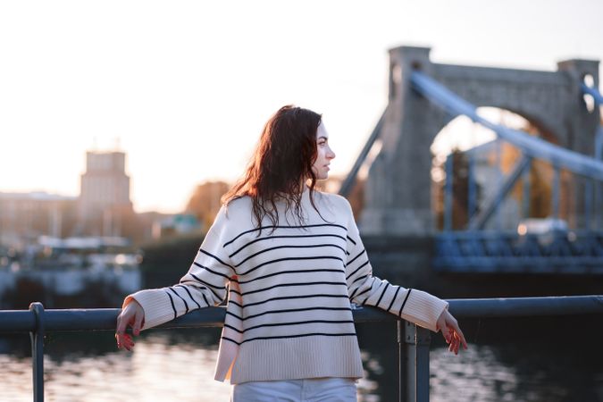 Young woman on bridge