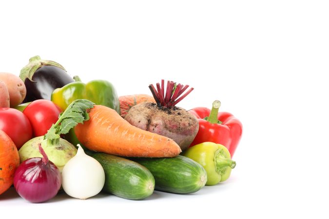 Composition with ripe vegetables isolated on plain background