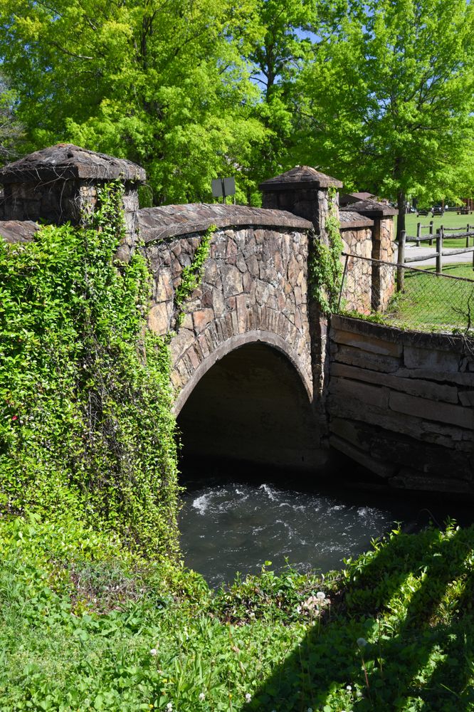 An old stone bridge at a park