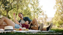 Smiling couple taking selfie on picnic 5znnj5