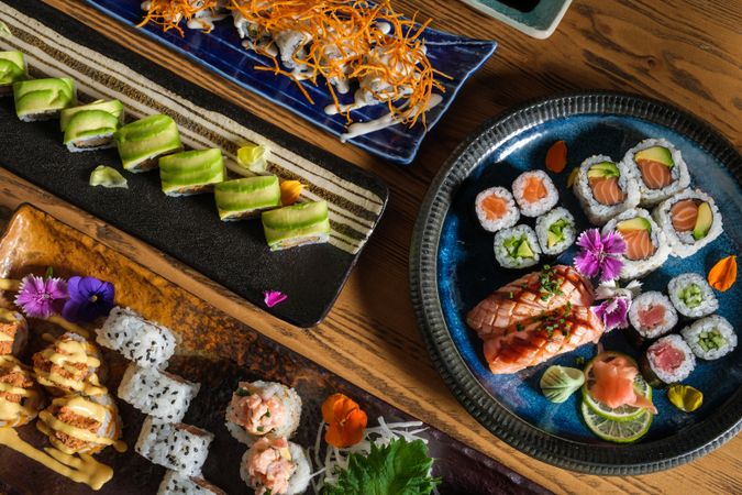 Assorted sushi served on trays