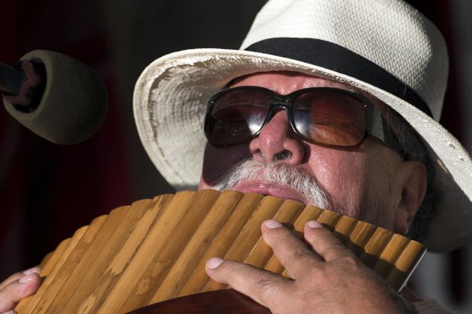 Des Moines, Iowa, USA - September 26, 2015: Cucho Madero plays the pan flute during