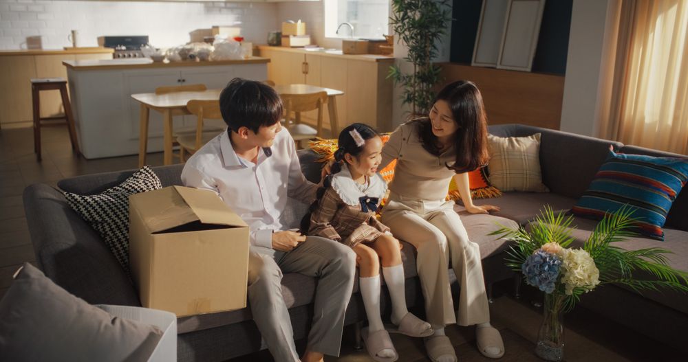Portrait of a Happy Korean Family Arriving at Their Newly Purchased Home