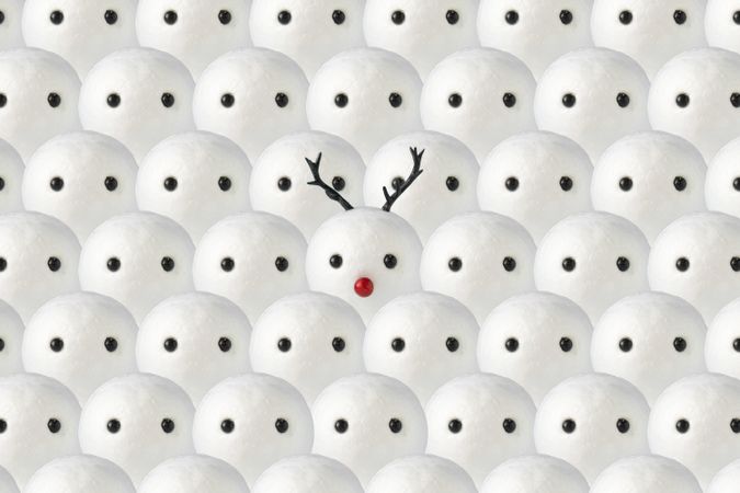 Snowmen pattern with one snowman with Christmas reindeer antlers